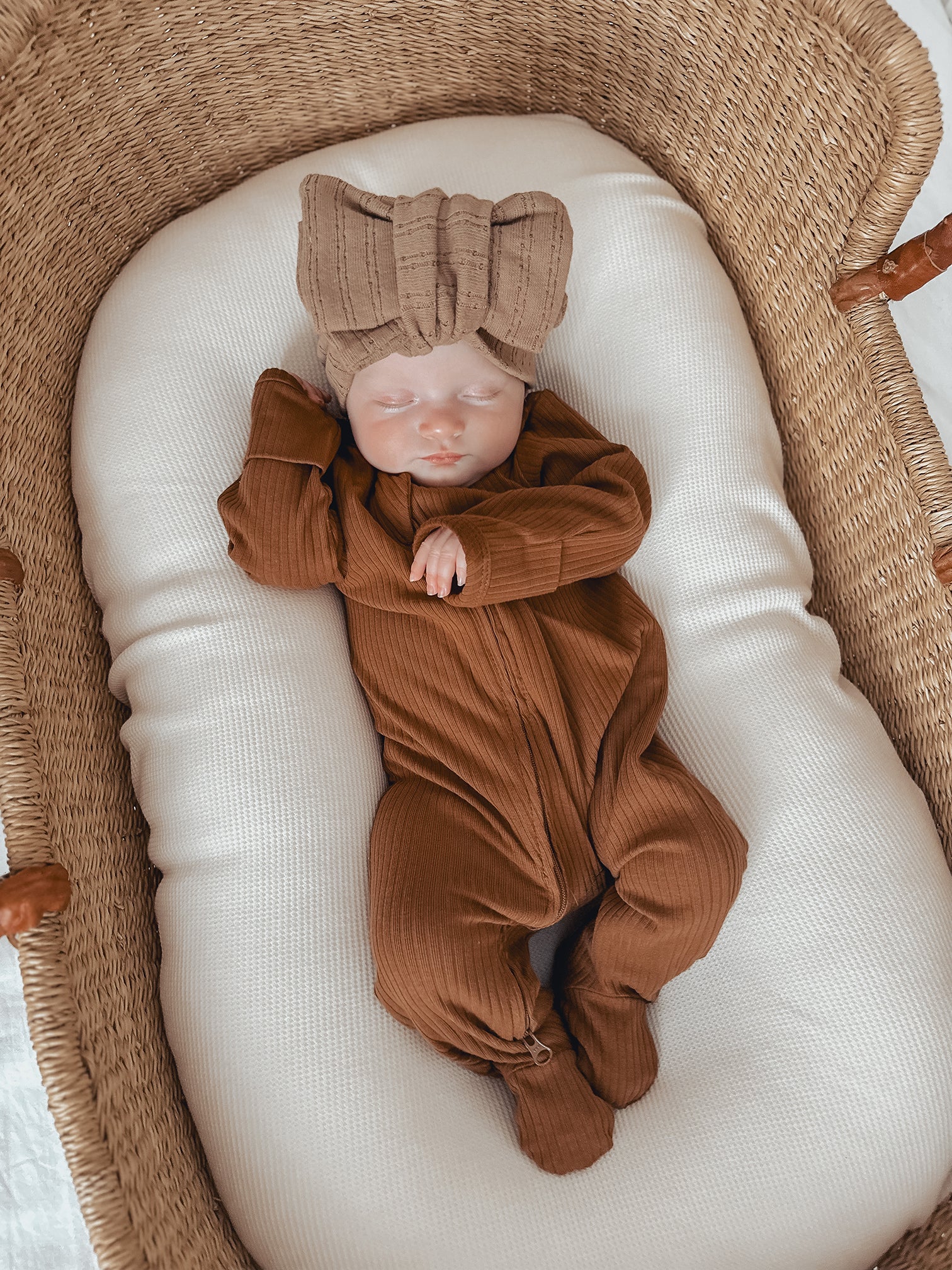 Neutral-toned ribbed romper for tiny tots - a perfect blend of fashion and comfort